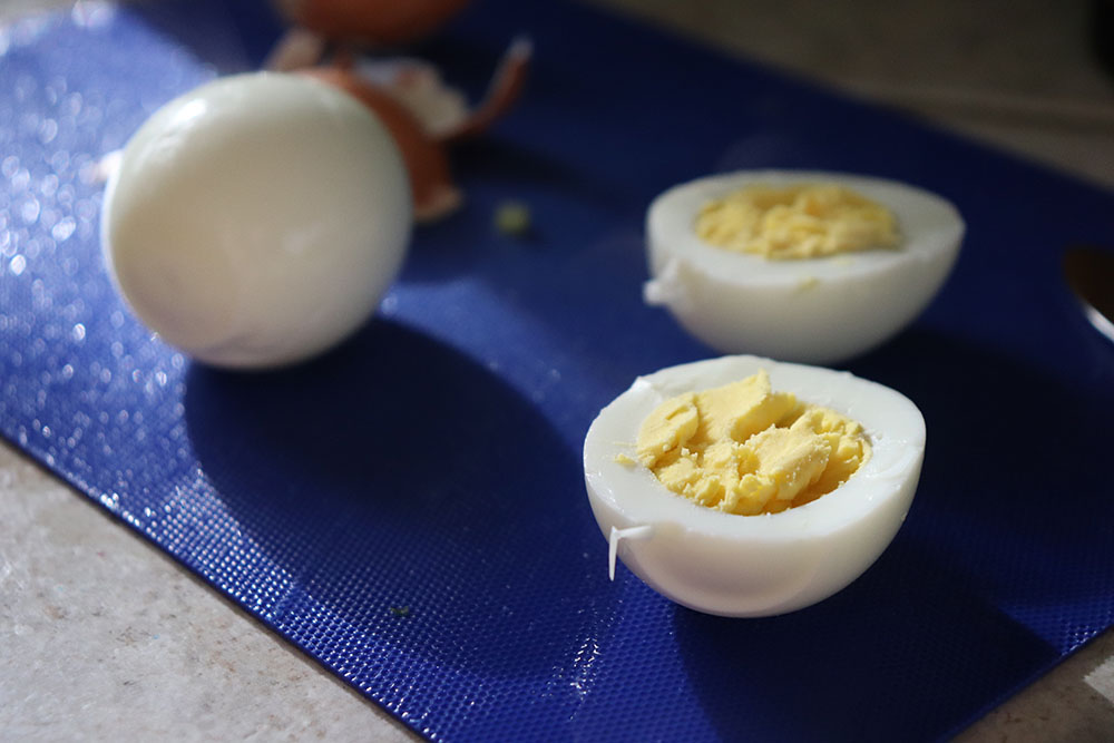 Learn how to make hard boiled eggs with farm fresh eggs that are easy to peel | HomemadeandHappy.com